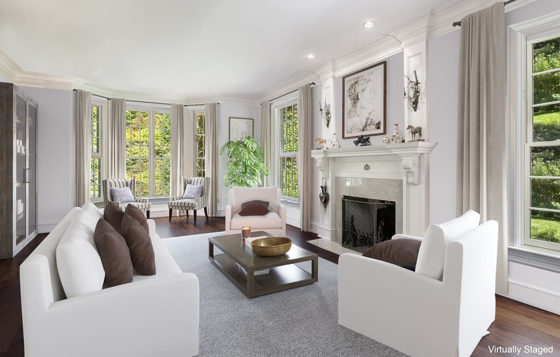 The same living room restyled with lighter contemporary furniture and a neutral rug.